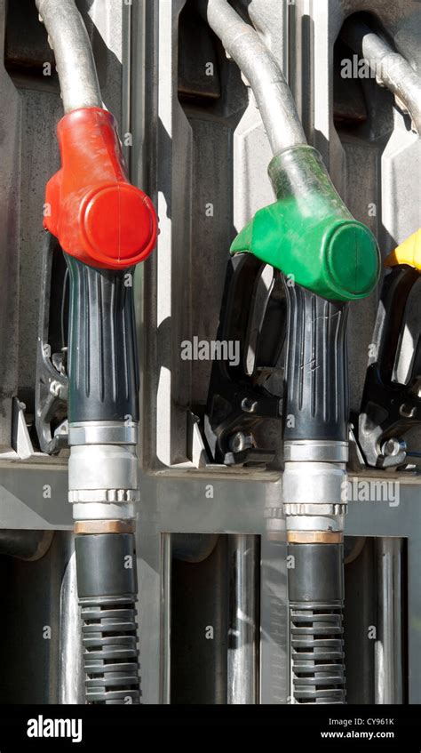 Several Gasoline Pump Nozzles At Petrol Station Stock Photo Alamy