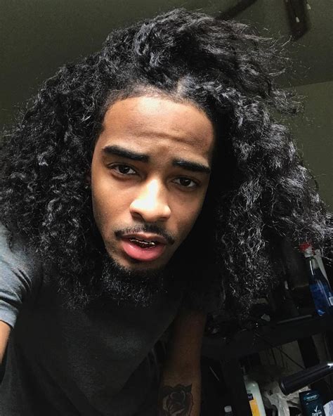 Attractive handsome black male model long curly hair | Long hair styles