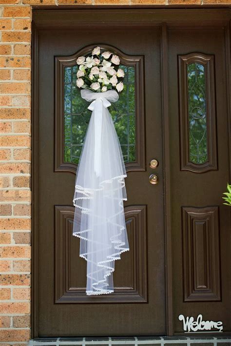 Flowers On The Front Door For The Wedding Day Wedding Door