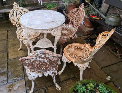 Set Of Four 19th Century Cast Iron Garden Chairs