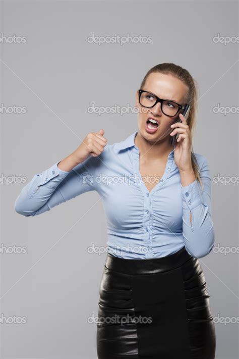 Angry Businesswoman Stock Photo By ©gpointstudio 34895319