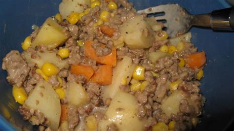 Brown ground beef and drain. hamburger casserole with cream of mushroom soup and potatoes