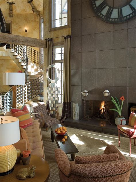 Living Room With Sleek Fireplace And Gray Tile Focal Wall Hgtv