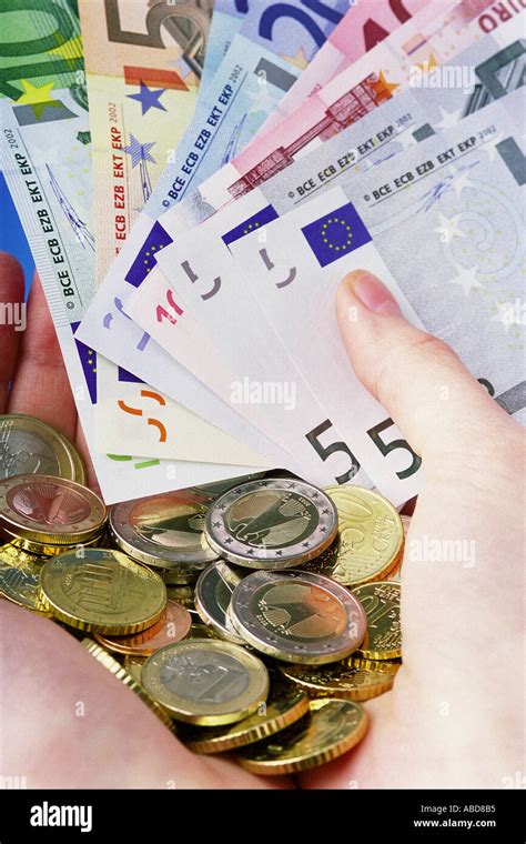 Euro Notes And Coins Stock Photo Alamy