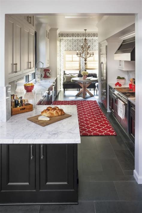 Find layout ideas for a narrow kitchen, plus inspiration for larger open plan galley kitchens. Transitional Galley Kitchen With White Marble Countertops ...