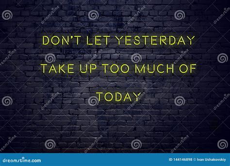 Positive Inspiring Quote On Neon Sign Against Brick Wall Dont Let Yesterday Take Up Too Much Of