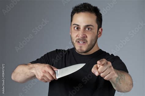 An Angry Man Holding A Knife Stock Photo Adobe Stock
