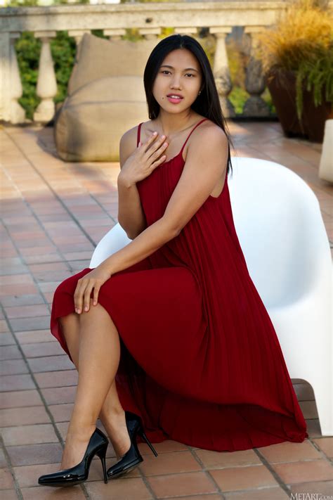 Glamour Babe In A Long Maroon Dress May Thai Strips To Show Her Delicious Slit Short Hair Cherie