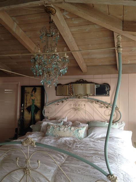 Antique Iron Bed Board Walls Raw Ceiling Green Chandelier Mirror