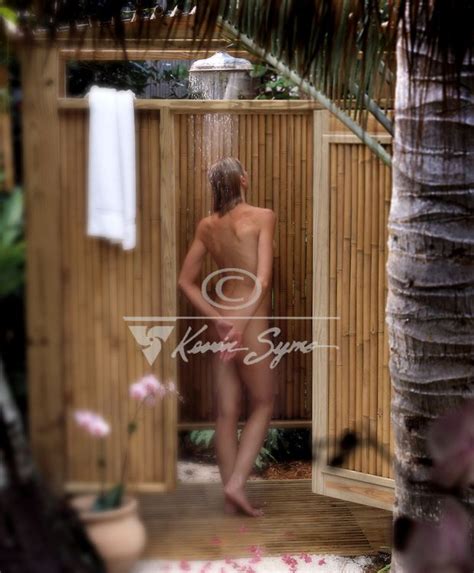 Tropical Showers Woman Taking A Tropical Outdoor Shower