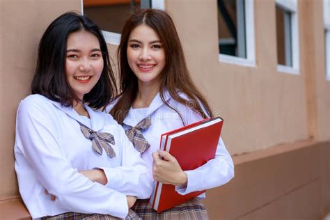 Cute And Young Girls Wearing Japanese Korean Style Schoolgirl Uniform