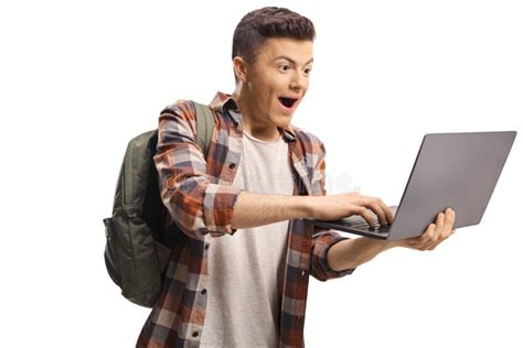 Excited And Happy Male Student Looking At A Laptop Computer Stock Image