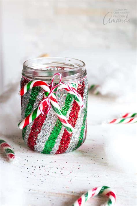 Learn how to build this fun peppermint candy decoration for your next party! Mason Jar Luminary: candy cane inspired glittery mason jars!