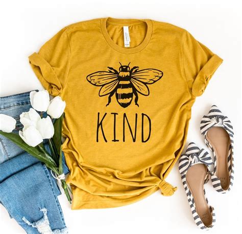 Add a little bit of rainbow to your look with this classic unisex tee featuring a colourful kindness embroidery. Bee Kind Shirt in 2020 | Kindness tee, Kindness shirts, Shirts