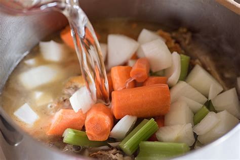 I'll show you how to make the broth from the carcass, and then put it together with the classic vegetables, and some pasta. Chicken Carcass Soup - Baking Mischief