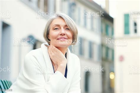 Outdoor Portrait Of Beautiful And Elegant Middle Age 55 60 Year Old