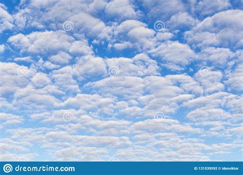 Many Fluffy Beautiful White Clouds Against Blue Sky Stock Photo - Image of against, beautiful 