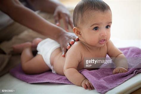 Son Massage Mom Photos And Premium High Res Pictures Getty Images