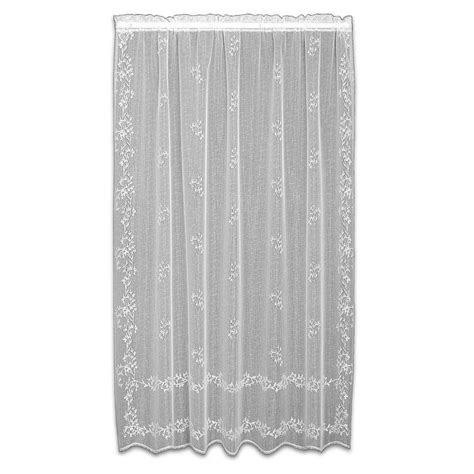 A White Curtain With Lace On It