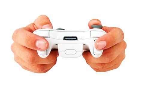 Human Hands Holding A Wireless Gaming Controller On White Background