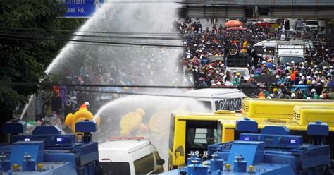 Thai Police Fire Water Cannon At Parliament Protest