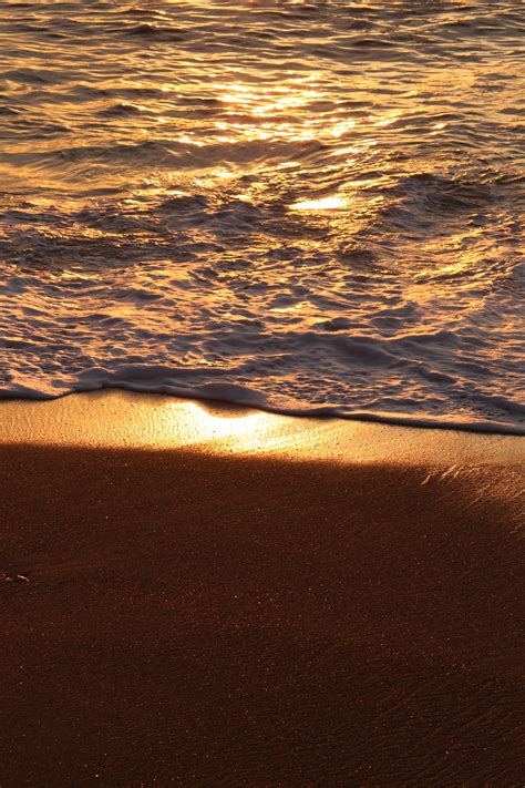 Безплатна снимка плаж море крайбрежие пясък океан хоризонт облак слънце изгрев залез