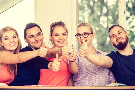 Happy Group Of Students With Thumbs Up Stock Photo Image Of