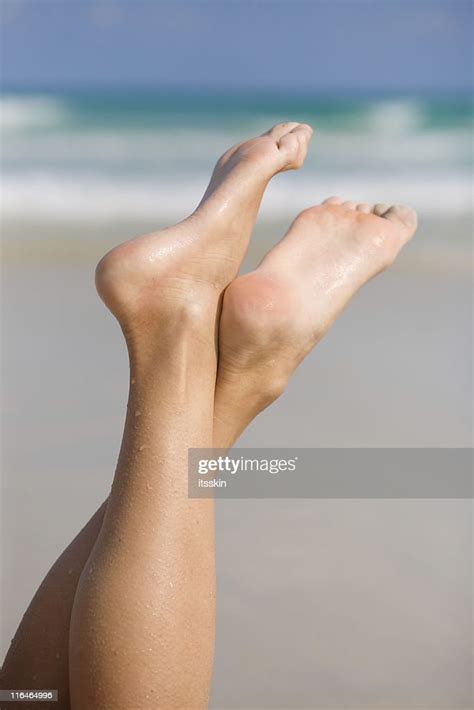 Legs Over The Beach High Res Stock Photo Getty Images