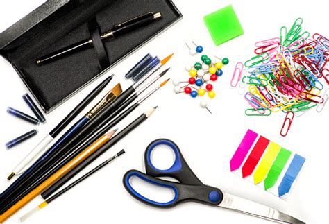 Office Supplies On White Ink Pen Brushes Scissors Pencils Eraser Paper