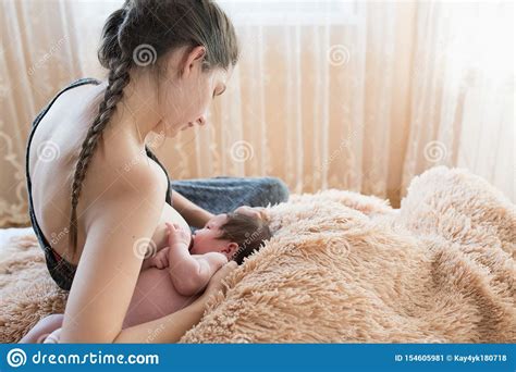 Mother Breastfeeds Baby Mother Breastfeeding Her Newborn Baby Beside