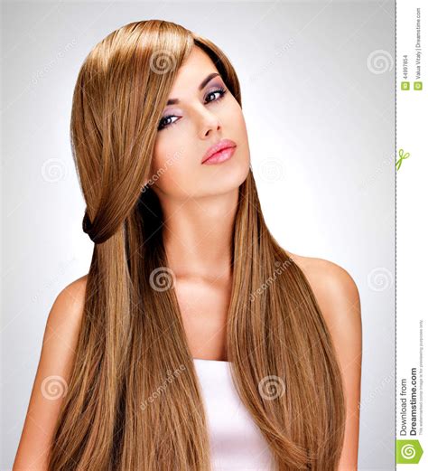 Oval faces, while being long and wide, are very symmetrical. Beautiful Indian Woman With Long Straight Brown Hair Stock ...