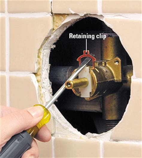 Detach from adjacent surfaces and components. Tub and Shower Cartridge Faucet Repair and Installation ...