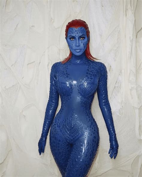 kim kardashian oozes sex appeal in blue latex costume as x men s mystique as she joins kendall