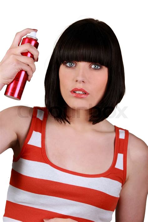 Woman Spraying Hair Lacquer Stock Image Colourbox