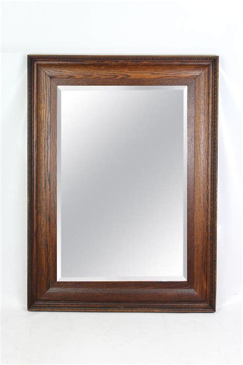 Look for a long entry table that is proportionate to the length of the spot that you want to place it, and coordinate materials with existing decor in your house. Large Antique Edwardian Oak Wall Mirror