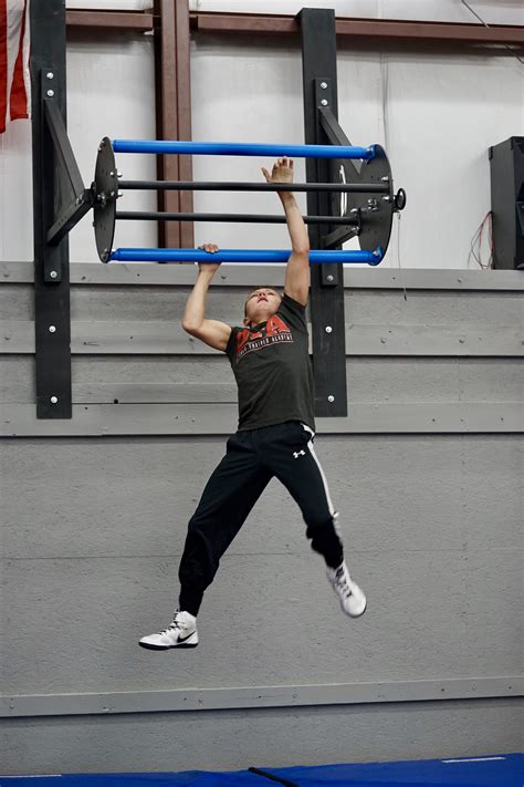 This classic grip hits both your biceps and forearms, as well as strengthening muscles that stabilise your spine. The Revolver Pull-up Bar - MoveStrong