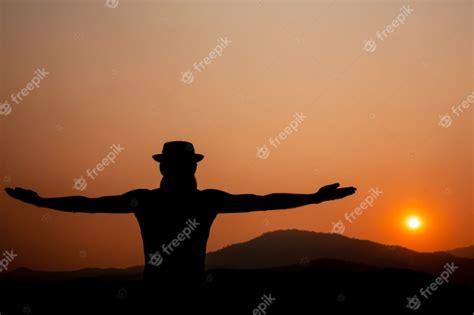 Free Photo Silhouette Of A Man With Outstretched Arms
