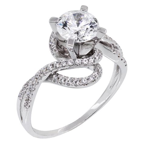 Halo engagement rings, pave' engagement rings, prong set engagement rings, three stone engagement rings, and solitaire engagement rings. Diamond Nexus Introduces New Engagement Ring Collection