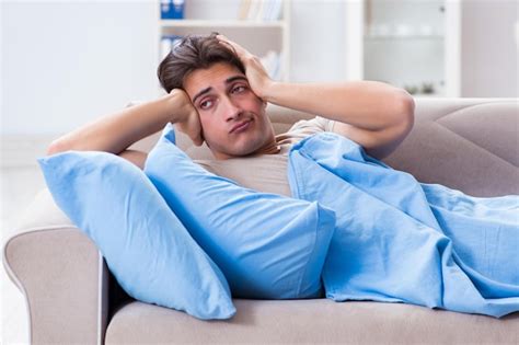 Premium Photo Man Suffering From Insomnia In Bed At Home