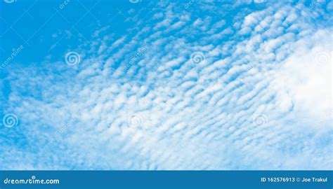 Fluffy Clouds Sea Wave With Clear Blue Sky Stock Image Image Of