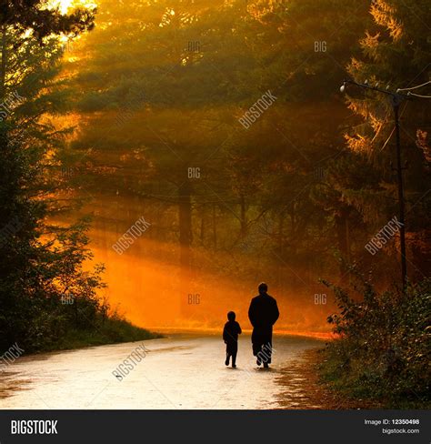 father son walking image and photo free trial bigstock
