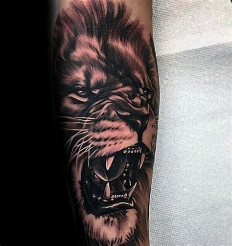 Alien lion color ink tattoo on man chest. 40 Lion Forearm Tattoos For Men - Manly Ink Ideas