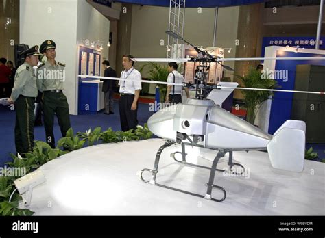 Chinese Paramilitary Police Officers Look At A Ucav Unmanned Combat