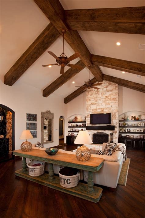 Slide the beams over the blocks of wood on the ceiling. Love the stained beams, the floor to ceiling fireplace ...