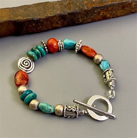 A Colorful Arrangement Of Genuine Turquoise And Gorgeous Red Coral