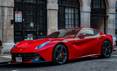 Red Ferrari F12berlinetta Sports Car By Toby Parsons