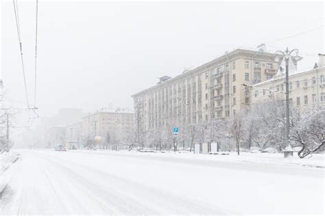 Heavy Snowfall In Moscow Houses And Streets During Blizzard Stock