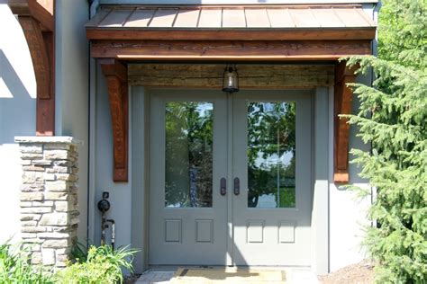 A new dormer window and front door with sidelites help brighten the interior of this renovated carriage house. Porch & Portico Additions & Remodel Syracuse CNY - Front ...