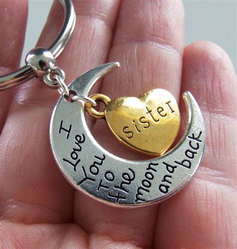 Having a sister as a sibling is one of the best feelings. Sister I love you to the moon and back keychain, sister ...