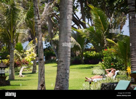 Sunbathing On The Grounds Hyatt Regency Sanur Bali Indonesia Stock